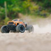 Arrma 1/10 GRANITE 4X2 BOOST MEGA 550 Brushed Monster Truck RTR met batterij en oplader, oranje